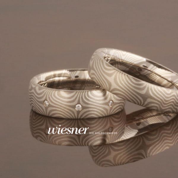 Mokume Gane Trauringe Bagassa mit Brillanten in den Sternchen