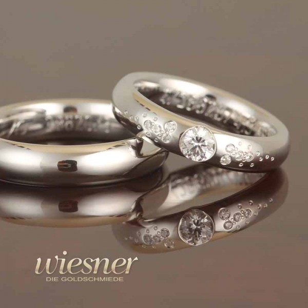 Gerstner Trauringe in Weißgold mit Diamanten und Politur