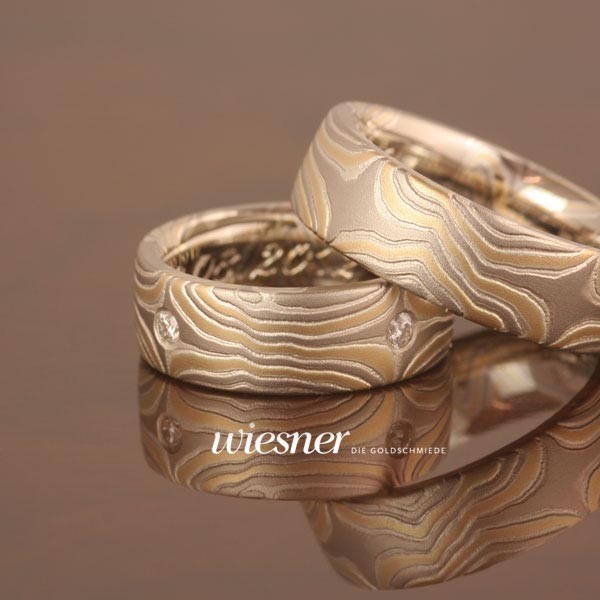 Limba Eheringe in Mokume Gane Technik mit Brillanten