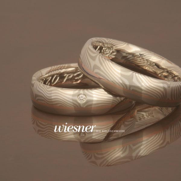 Mokume Gane Trauringe Bagassa mit Diamant und poliert