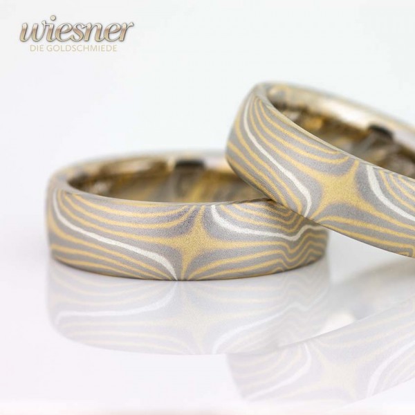 Wonderful wedding rings forged in Andira Mokume Gane