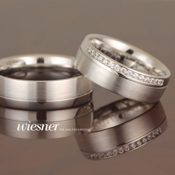 White gold wedding rings, matt and polished with diamonds