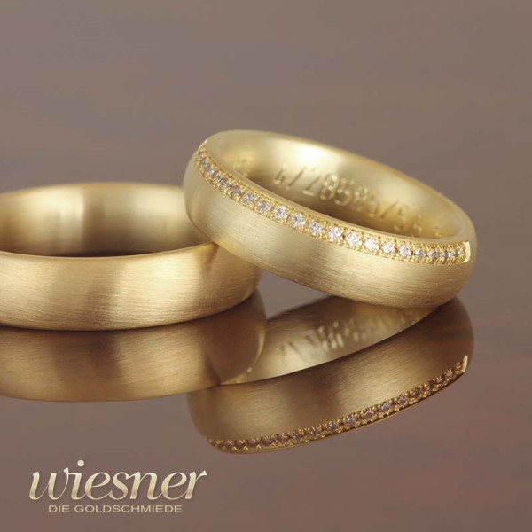 Elegante Gerstner Trauringe aus Gold mit Brillanten