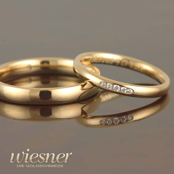 Gerstner wedding rings 28501 in yellow gold with diamonds