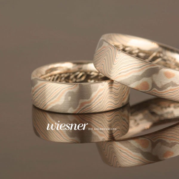 Mokume Gane Trauringe Bubinga mit Rotgold geschmiedet