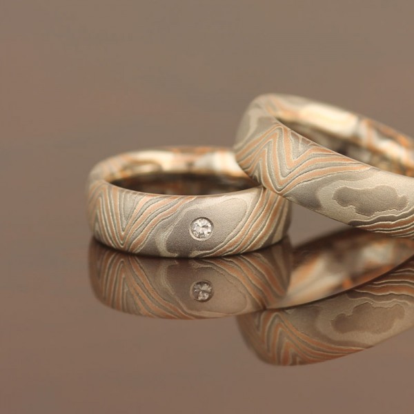 Expressive | Garapa wedding rings forged in Mokume Gane technique