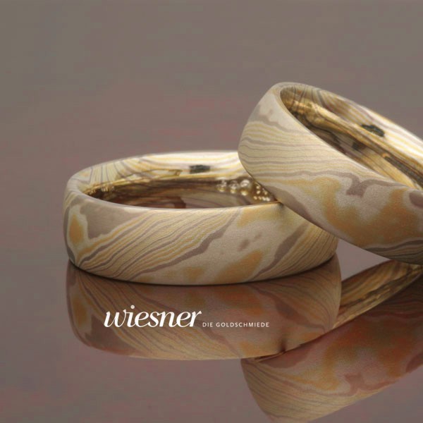 Mokume Gane Trauringe Bubinga mit Gelbgold und Palladium und Silber