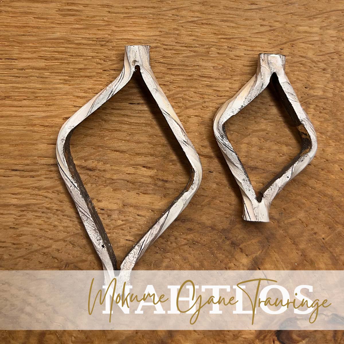 Mokume Gane Eheirnge wie Damaststahl